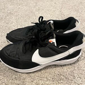 Women’s Nike shoes. Waffle Debut.